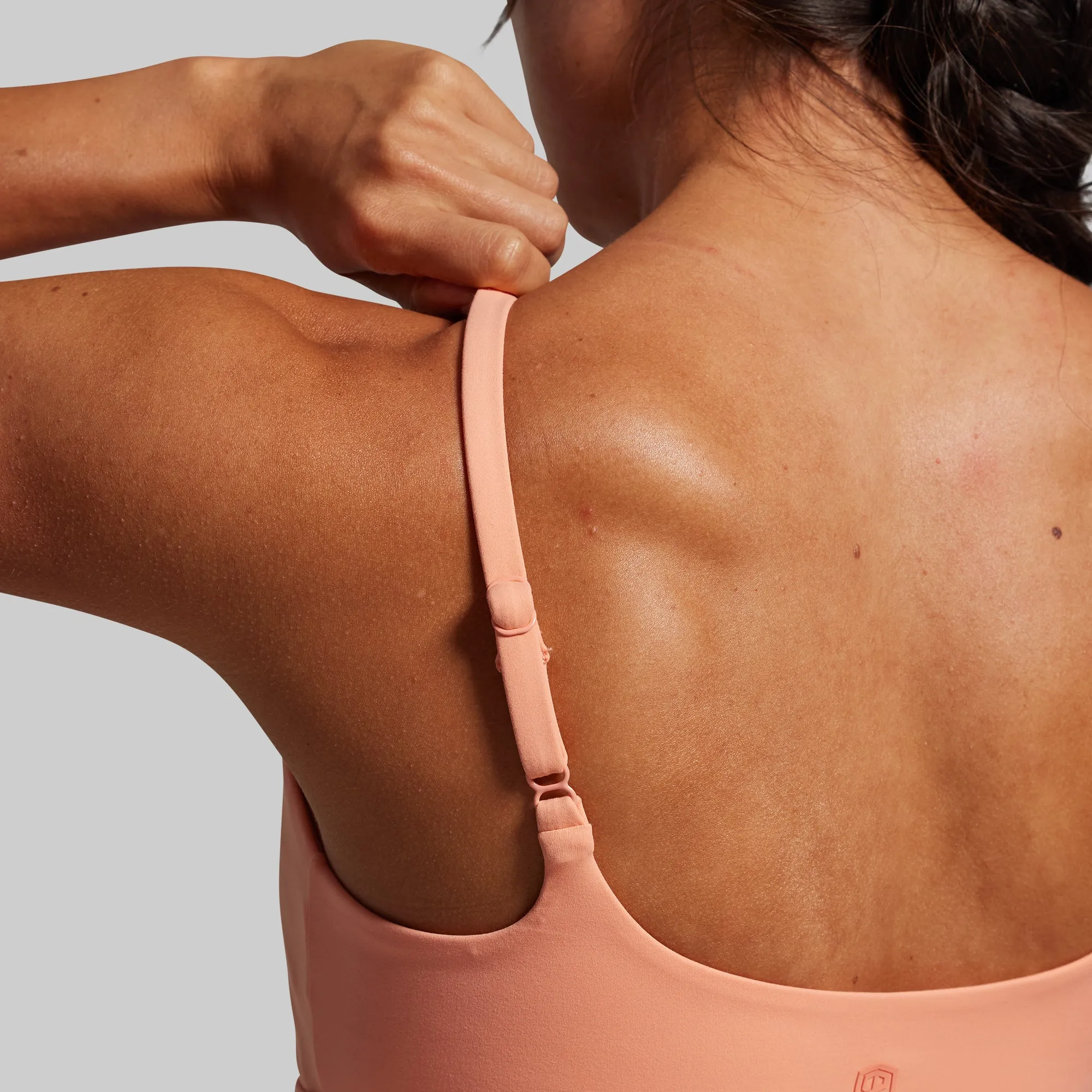 Reset Sports Bra (Melon) Drawstring closure