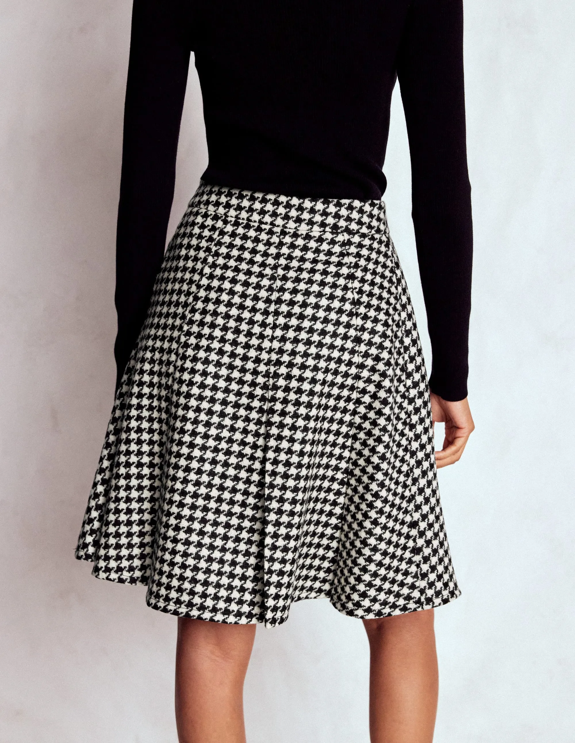 Flippy Wool Skirt-Black Dogstooth Pleated Construction