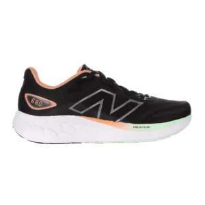 New Balance Women's Fresh Foam 680 V8 Running Shoe - W680CB8 running during a foggy day elevated - heel shoes