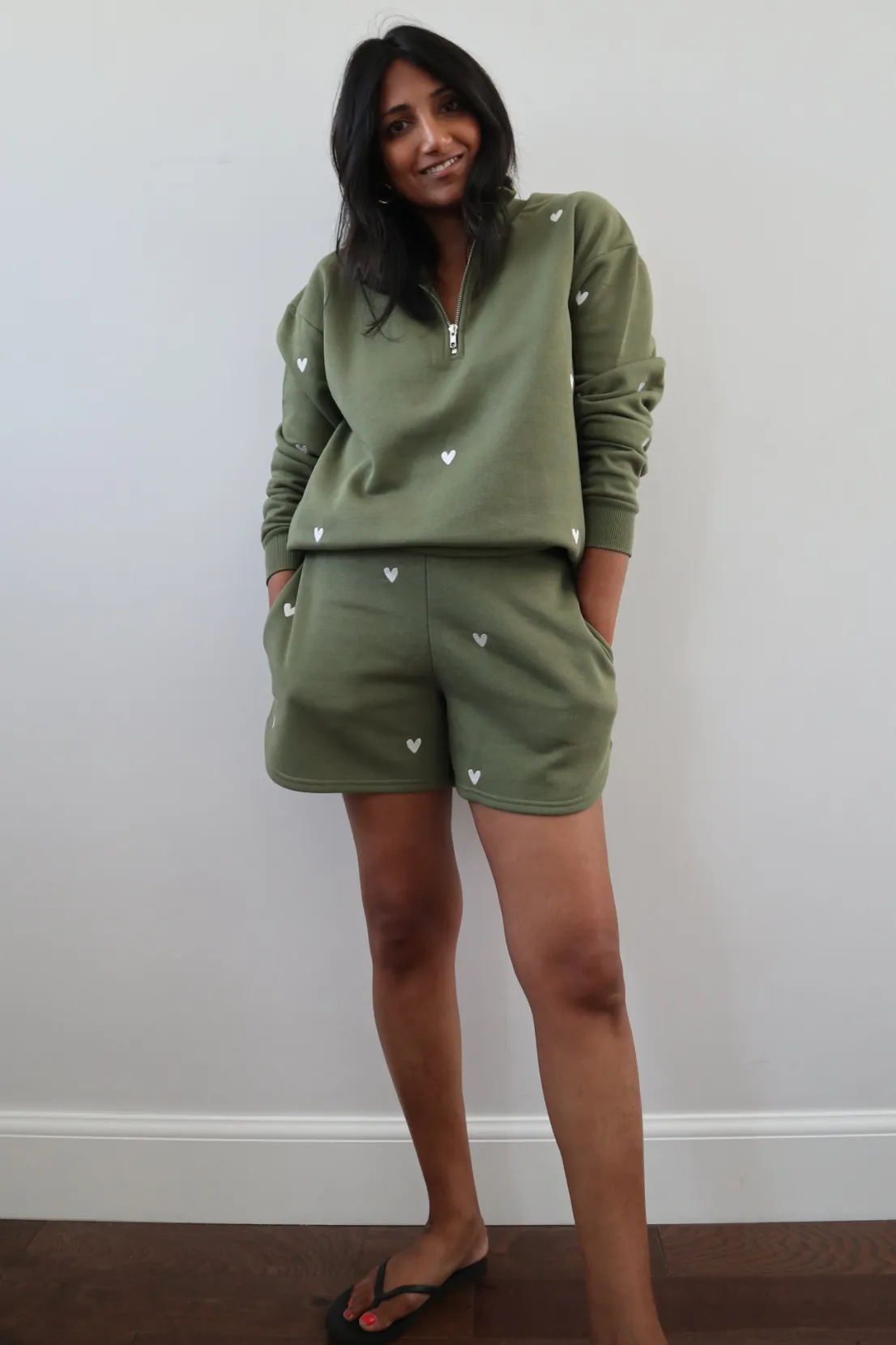 Water Resistant product abstract mystery O&F Olive Heart Embroidered Quarter Zip Sweatshirt