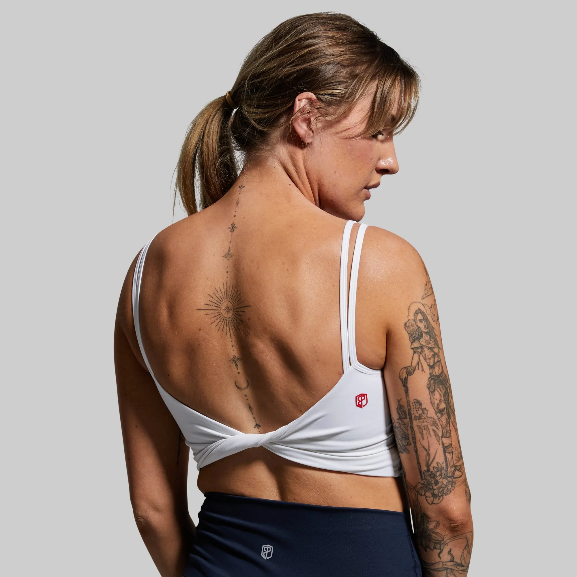 Don't Get It Twisted Sports Bra (Brand Strength-White) Low Profile Padding competitions