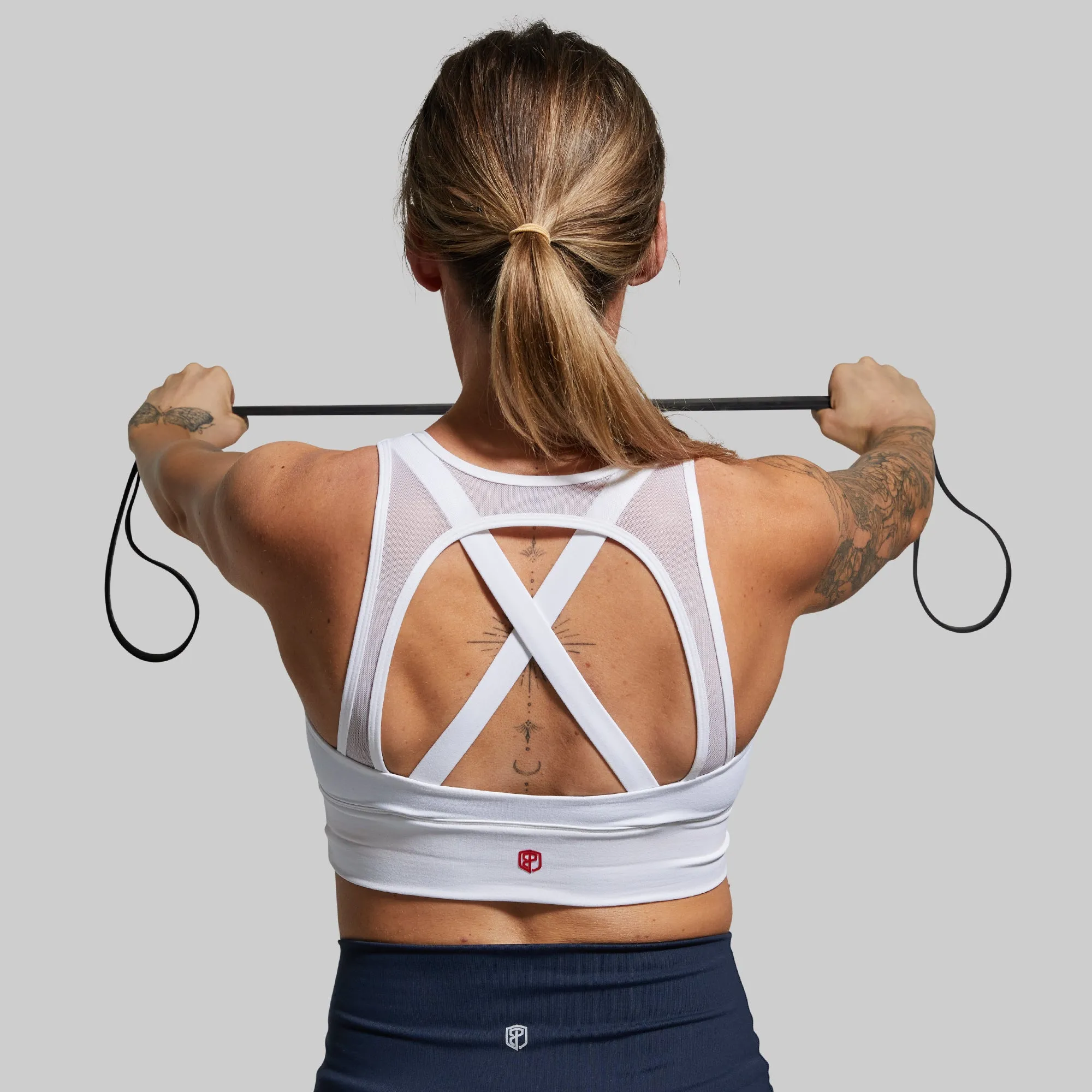 X-Factor Sports Bra (Brand Strength-White) Embroidered edges