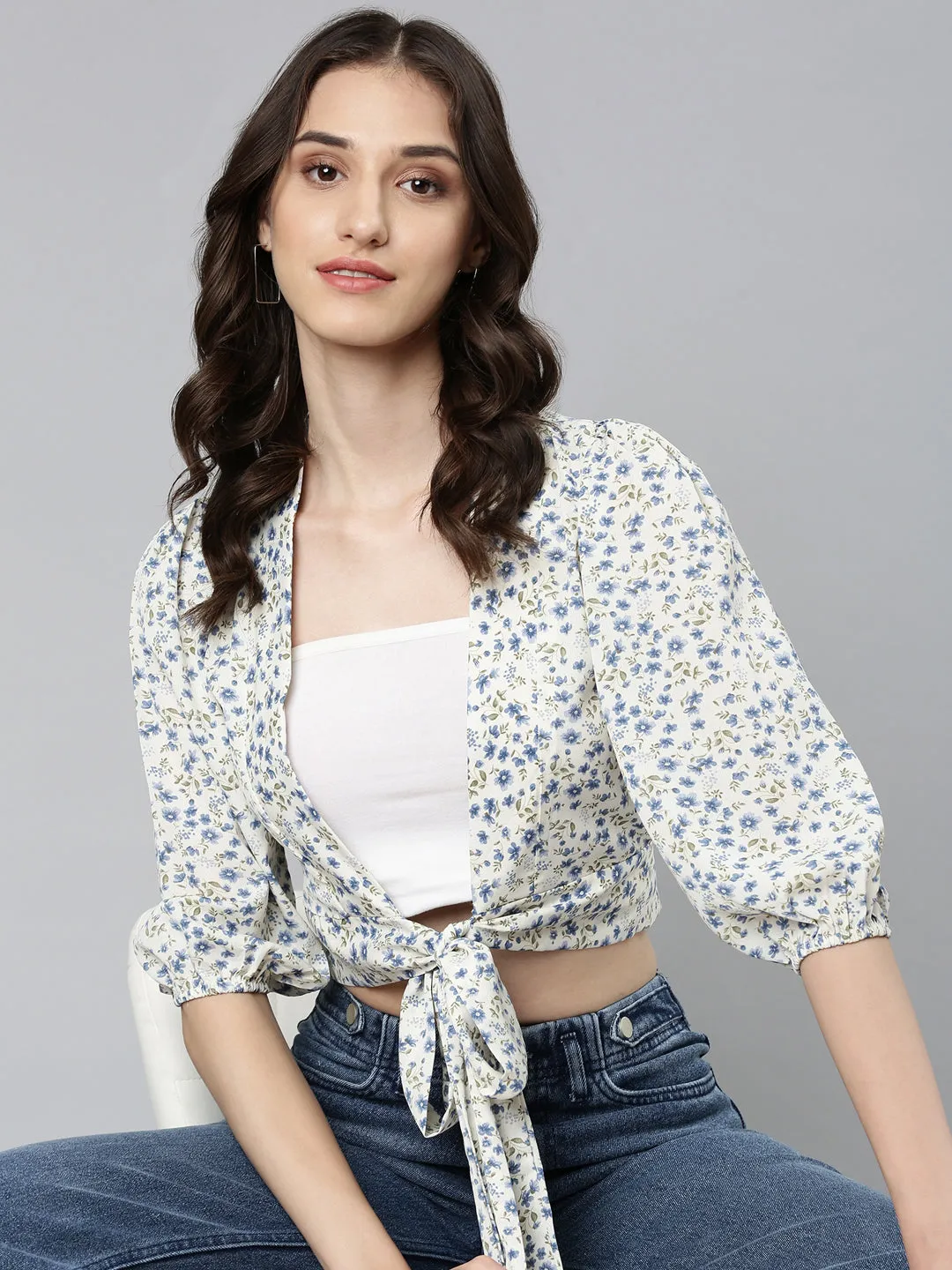 NonRestrictiveCut Women's Cream Floral Printed Puffed Sleeves Tie-Ups Crepe Wrap Crop Top